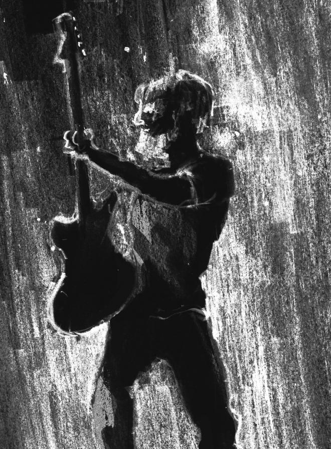 Rysunek Edyty Krzyżanowskiej. Gitarzysta.